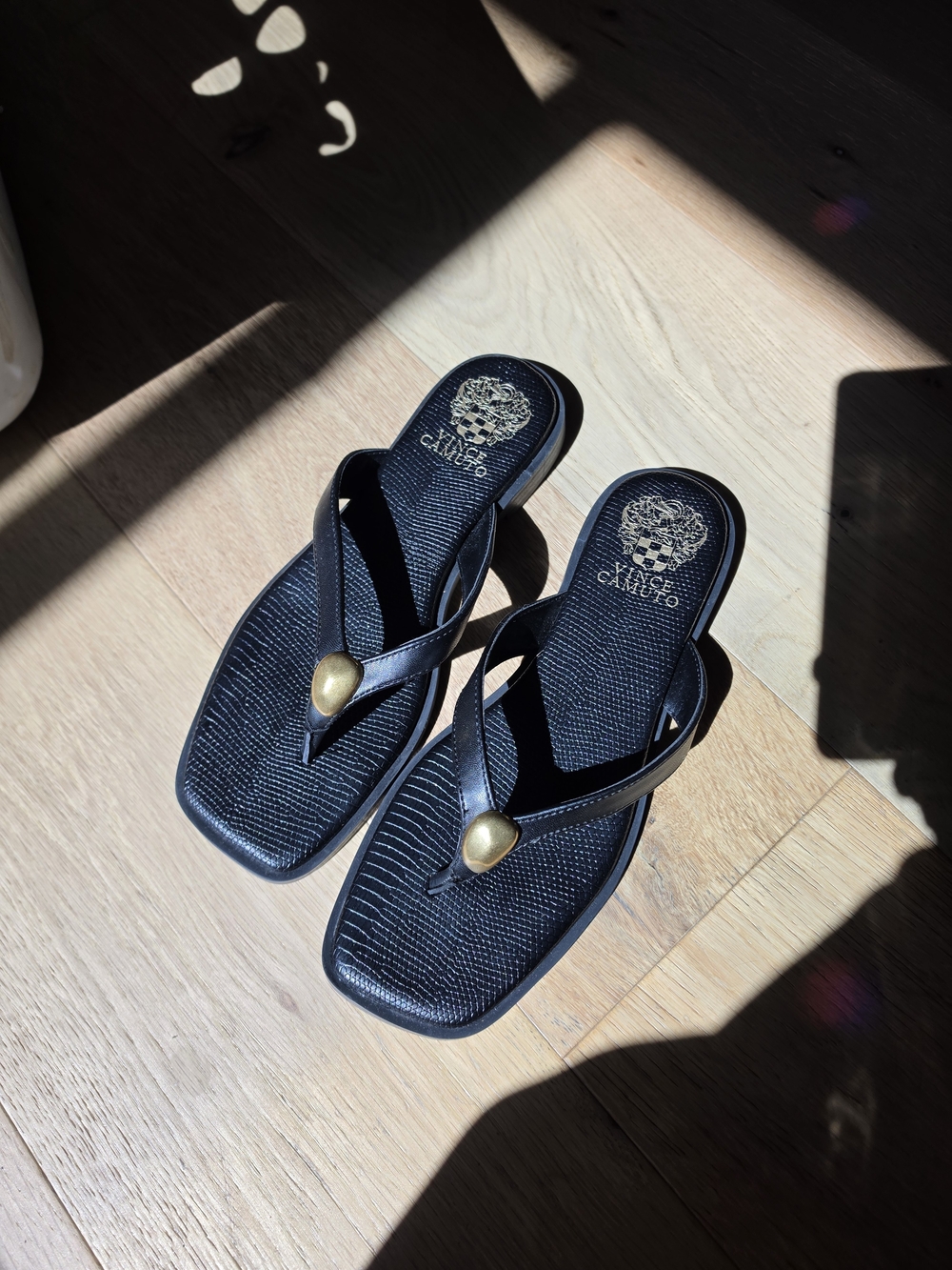 Black Leather Thong Sandals with Gold Accent